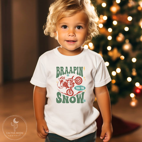 Braapin' Thru the Snow Santa on a Dirt Bike Toddler Short Sleeve Tee | Kids Moto Girl Shirt | Moto Toddler Christmas T-Shirt